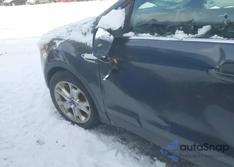 2015 Ford Escape Titanium z USA, uszkodzony, nr VIN 1FMCU9JX2FUA86006